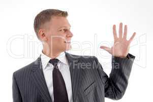 portrait of businessman counting fingers