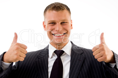 portrait of pleased businessman with thumbs up