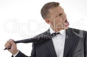 businessman tightening his tie
