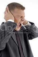 side pose of shouting businessman