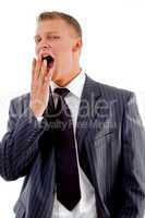 yawning young businessman