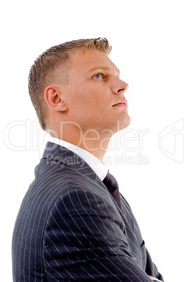 side view of businessman looking upward