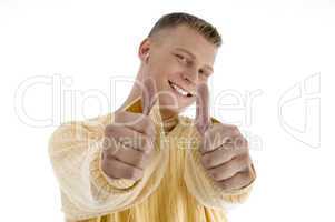 handsome man showing good luck sign with both hands