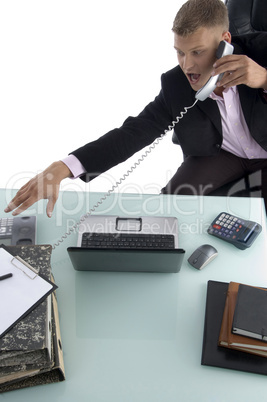 sitting businessman busy on the phone
