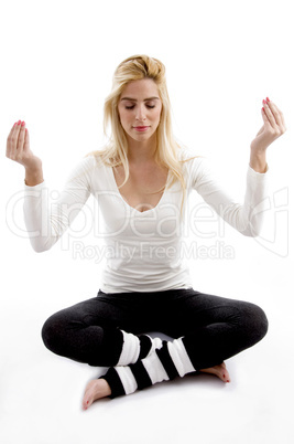 front view of woman practicing yoga