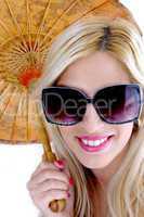 front view of smiling woman in sunglasses