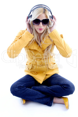 front view of sitting woman enjoying music