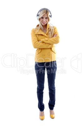 front view of standing woman wearing headphone