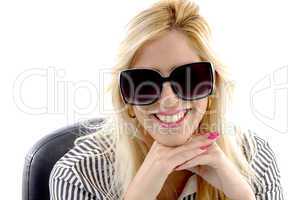 portrait of smiling woman wearing sunglasses