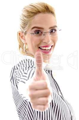side view of businesswoman with thumbs up