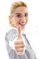 side view of businesswoman with thumbs up