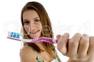 beautiful young woman with toothbrush