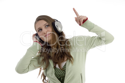 woman in dancing posture while listening music woman in dancing posture while listening music