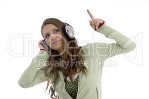 woman in dancing posture while listening music
