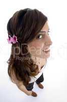glamorous woman with beautiful flower in hair