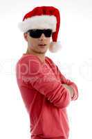 christmas hat wearing male folded arms