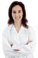 young female doctor posing with her arms crossed