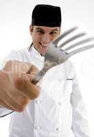 close up view of fork holding chef