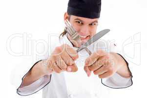 chef - cooking tools held by man