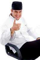 smart male chef with thumbs up hands gesture