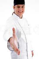 cooking chef offering handshake