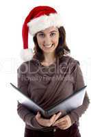 business woman holding files and wearing christmas hat
