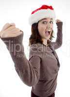 successful teenager wearing christmas hat