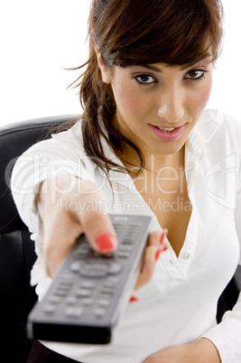 front view of female executive watching television