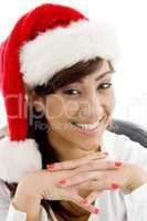 front view of smiling female accountant in christmas hat