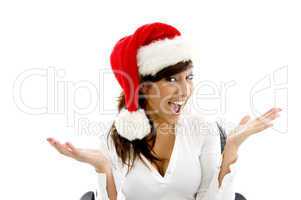 front view of happy female executive wearing christmas hat