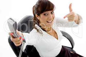 high angle view of businesswoman pointing at phone