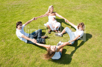 Playful family on grass