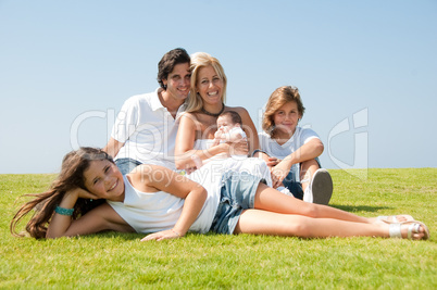 Happy family on grass