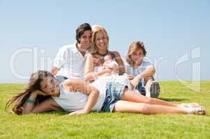 Happy family on grass