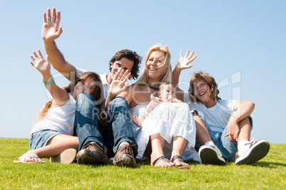 Family play on meadow