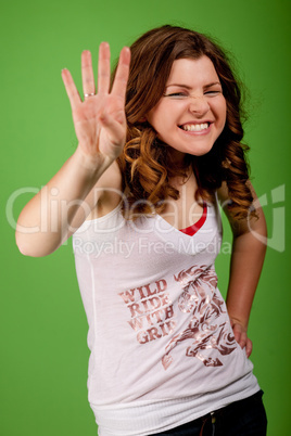 Young girl showing four fingers