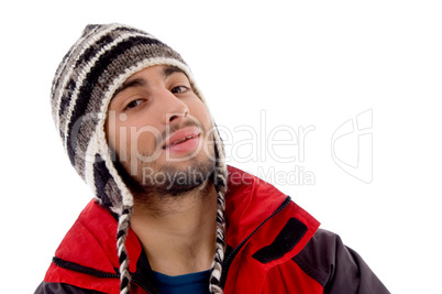 handsome young caucasian in winter clothes looking at camera