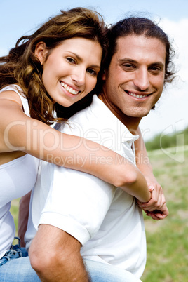 Smiling couple fooling around