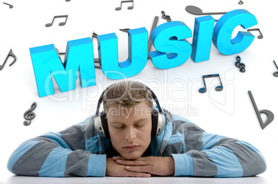 laying man enjoying music