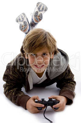 front view of smiling young boy with joystick