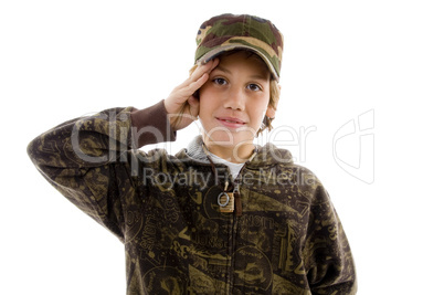 front view of saluting young boy