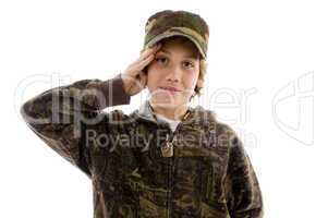 front view of saluting young boy