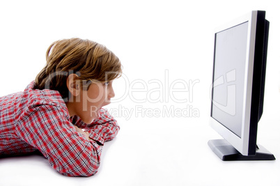 side pose of boy watching lcd screen