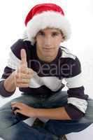 boy with christmas hat and wishing goodluck