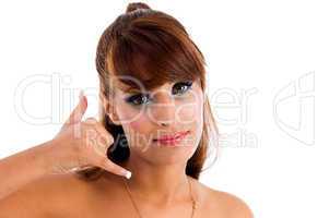 glamorous female showing telephonic gesture