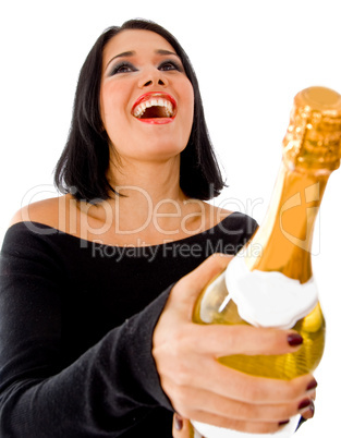 front view of happy model holding champagne bottle
