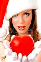 close view of christmas female holding heart