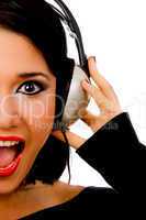 portrait of happy young female listening music