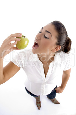 high angle view of standing woman with apple