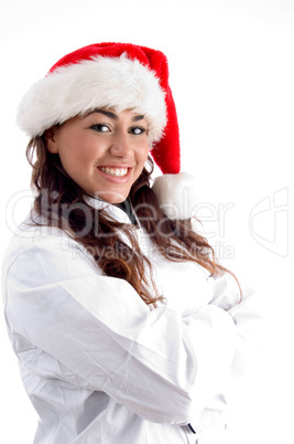 smiling young woman wearing christmas hat